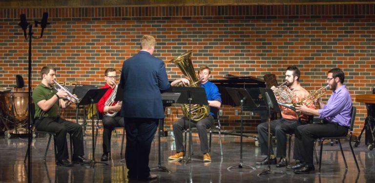 A group of music students perform a senior recital.